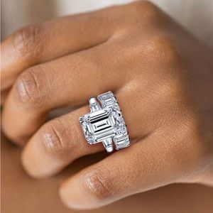 Italo Three Stone Emerald Cut Engagement Rings Sets